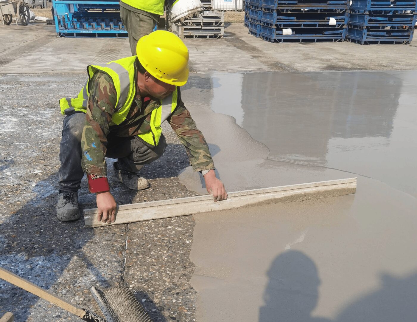 Self-leveling underlayment being installed
